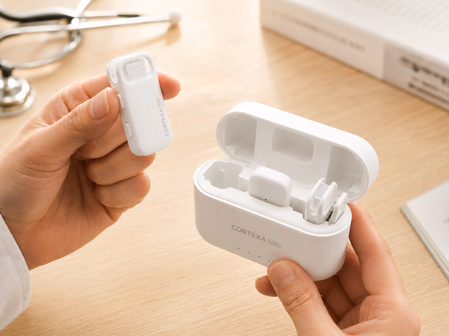 Taking an R1 microphone out of its charging case